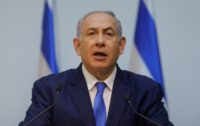 Israeli Prime Minister Benjamin Netanyahu delivers a statement at parliament in this file picture taken on December 19, 2018 Destruction of tunnels from Lebanon 'nearly done': Netanyahu