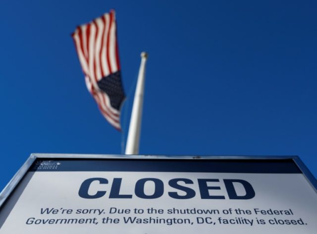 A sign pictured on December 22, 2018 announces the closure of a government building due to the shutdown Workers fret at making ends meet as US govt shutdown persists