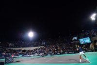 Novak Djokovic returns the ball to Kevin Anderson during the Mubadala World Tennis Championship final