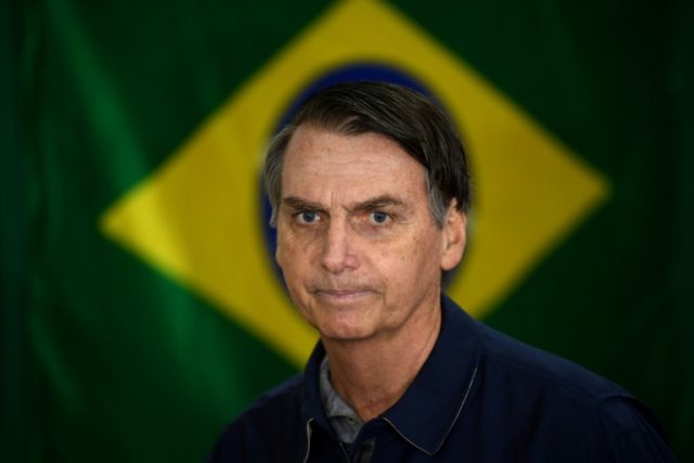 Brazil's Bolsonaro follows through on gun, 'anti-Marxist' vows