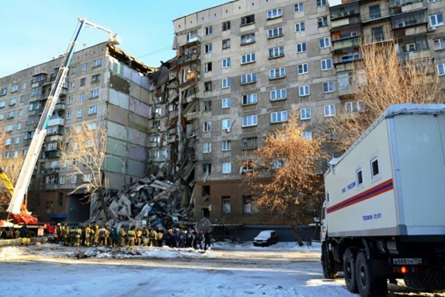 Hunt for survivors as Putin rushes to scene of deadly high-rise blast