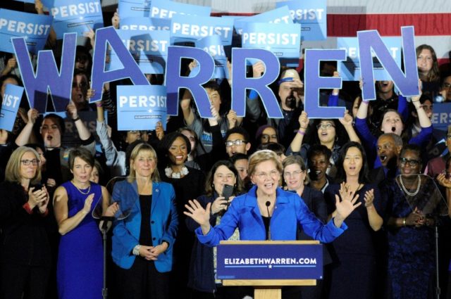 US Senator Elizabeth Warren -- seen here on midterm election day 2018 addressing the crowd at a celebration in Boston -- is a fierce critic of Donald Trump, and is now likely running to unseat him in 2020 Democrat Warren enters 2020 White House race