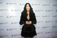 The Latest: Cher thought she was too 'out there' for award