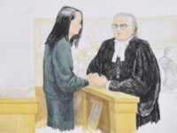 China Huawei In this courtroom sketch, Meng Wanzhou, left, the chief financial officer of Huawei Technologies, speaks to her lawyer David Martin during a bail hearing at British Columbia Supreme Court in Vancouver, British Columbia, Monday, Dec. 10, 2018. (Jane Wolsak/The Canadian Press via AP) The Associated Press