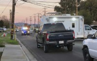 Authorities hunt California police officer's killer