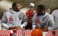 The Latest: Suspended Clemson DT Lawrence supports teammates