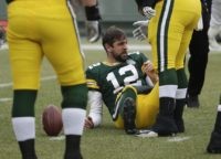 The Latest: Packers' Rodgers leaves game with concussion