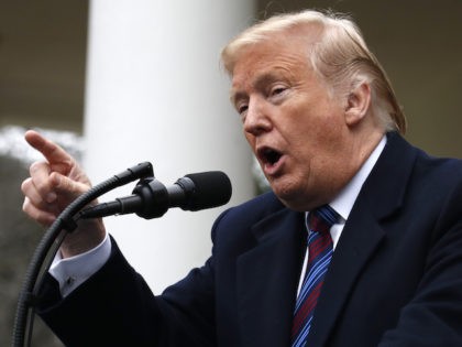 President Donald Trump speaks in the Rose Garden of the White House, as he is joined by Co