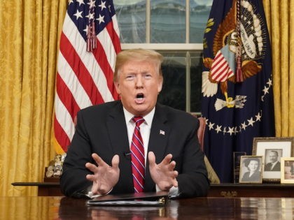 U.S. President Donald Trump delivers a televised address to the nation from his desk in t