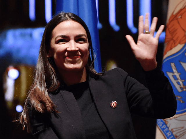 US Representative Alexandria Ocasio-Cortez attends a swearing-in ceremony and welcome reception for new Hispanic members of the US Congress in Washington, DC, on January 9, 2019 (Photo by Nicholas Kamm / AFP) (Photo credit should read NICHOLAS KAMM/AFP/Getty Images)