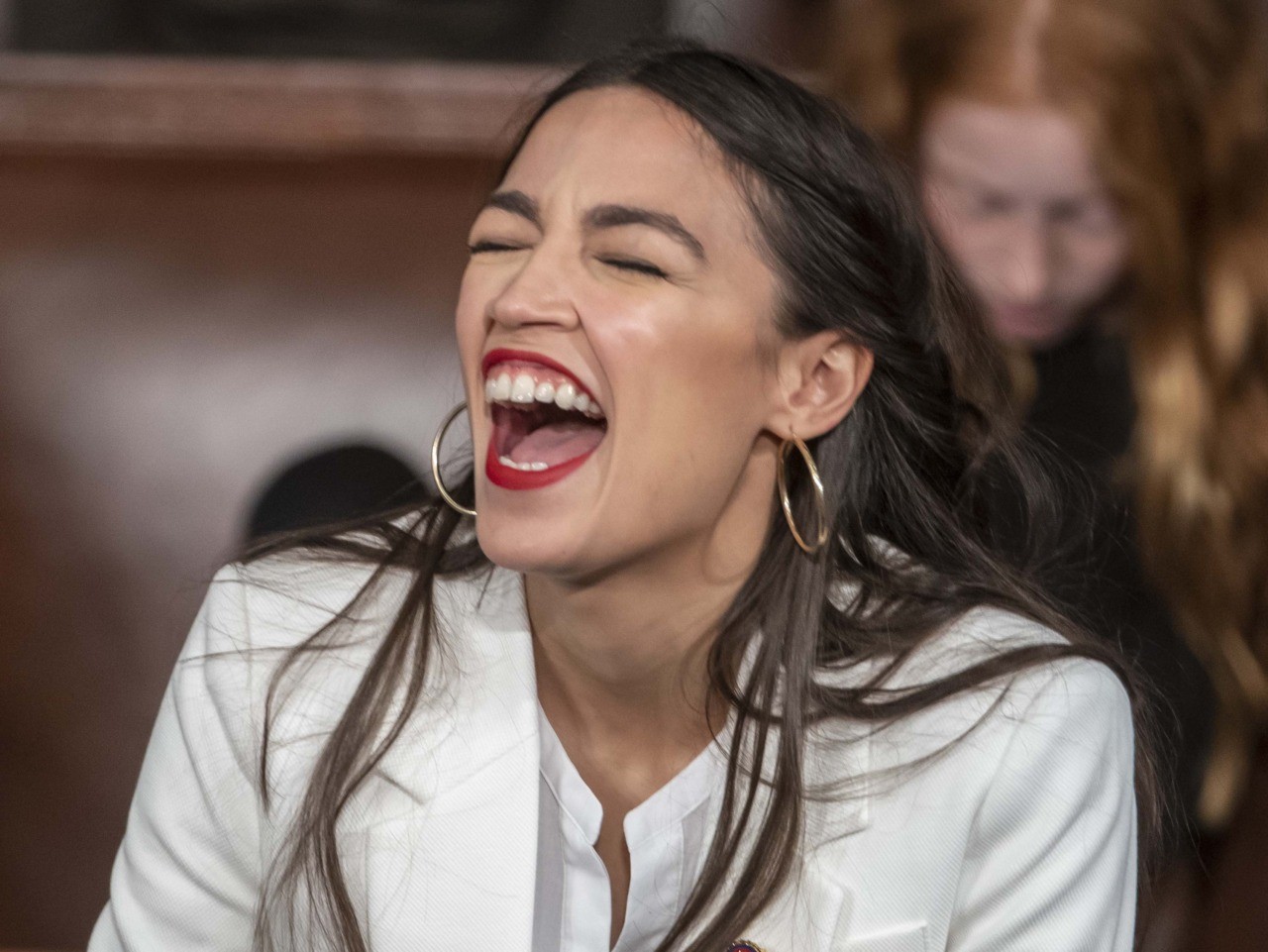 [Image: Alexandria-Ocasio-Cortez-laughing-Associated-Press.jpg]