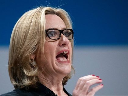 BIRMINGHAM, ENGLAND - OCTOBER 04: Home Secretary Amber Rudd speaks on stage on the third day of the Conservative Party Conference 2016 at the ICC Birmingham on October 4, 2016 in Birmingham, England. Ministers and senior Party members will address delegates throughout the day with a number of speeches discussing …
