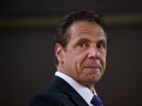 Andrew-Cuomo-looking-back-getty New York Governor Andrew Cuomo pauses while he delivers remarks during a dedication ceremony to mark the opening of the new campus of Cornell Tech on Roosevelt Island, September 13, 2017 in New York City. Seven years ago, former New York City Mayor Michael Bloomberg created a competition that invited …