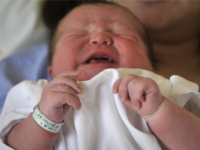 Baby boy George Doikas, born on on October 31, 2011, cries at a state maternity hopital in Athens. The United Nations says that by its best estimates the seven billionth baby will be born on October 31, and countries around the world have planned events surrounding the demographic milestone. AFP …