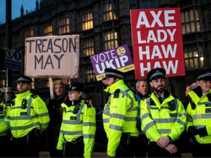 LONDON, ENGLAND - JANUARY 15: Police officers form a line as pro-Brexit protesters demonst