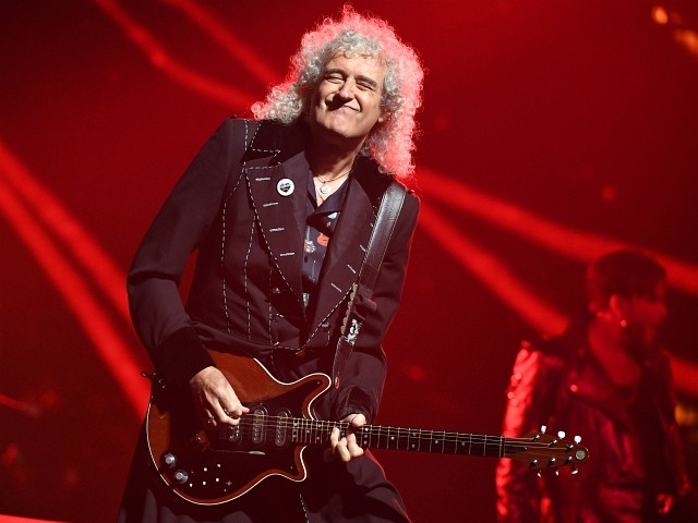 Queen Guitarist Pens Song to Celebrate NASA’s Historic Flyby