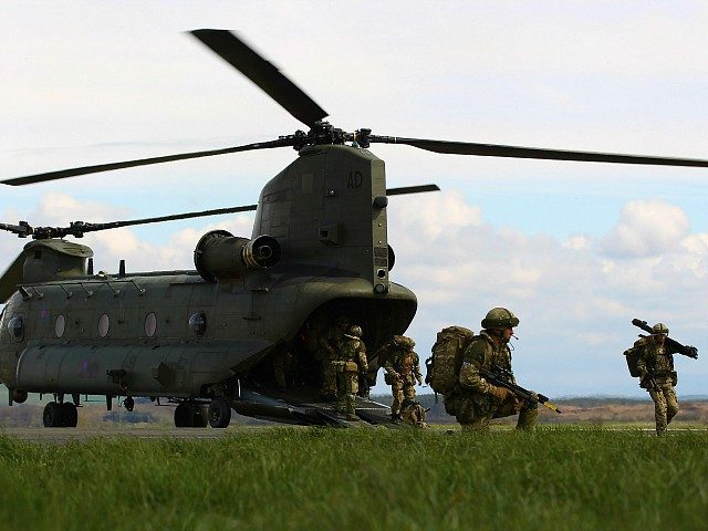 STRANRAER, SCOTLAND - APRIL 16: Soldiers from 16 Air Assault Brigade take part in Exercise Joint Warrior at West Freugh Airfield on April 16, 2012 in Starnraer, Scotland. The operation is taking place in South West Scotland between 15-21 April and focuses on a Theatre Entry operation into a notional …