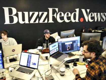 NEW YORK, NY - DECEMBER 11: Members of the BuzzFeed News team work at their desks at BuzzFeed headquarters, December 11, 2018 in New York City. BuzzFeed is an American internet media and news company that was founded in 2006. According to a recent report in The New York Times, …