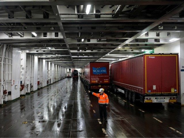 DOVER, ENGLAND - MARCH 05: Lorry drivers are guided as they board a ferry to Calais at the port of Dover on March 5, 2018 in Dover, England. The haulage industry faces an uncertain future while Brexit negotiations between the British government and the European Union continue. Many in the …