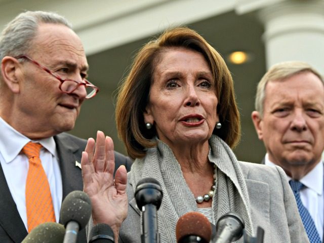 House Speaker Nancy Pelosi of Calif., center, speaks about her oath of office as she stand