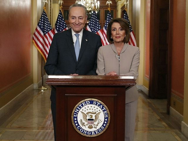 House Speaker Nancy Pelosi of Calif., and Senate Minority Leader Chuck Schumer of N.Y., po