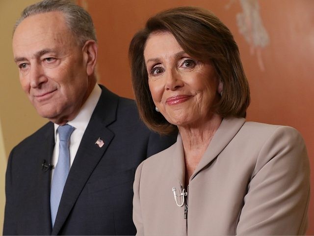 WASHINGTON, DC - JANUARY 08: Speaker of the House Nancy Pelosi (D-CA) and Senate Minority Leader Charles Schumer (D-NY) pose for photographs after delivering a televised response to President Donald Trump's national address about border security at the U.S. Capitol January 08, 2019 in Washington, DC. Republicans and Democrats seem …