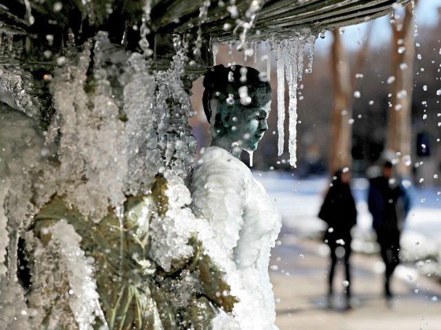 A water fountain freezes in the cold weather in Atlanta, Wednesday, Jan. 17, 2018. The South awoke on Wednesday to a two-part Arctic mess. First came a thin blanket of snow and ice, and then came the below-zero wind chills and record-breaking low temperatures in New Orleans and other cities.
