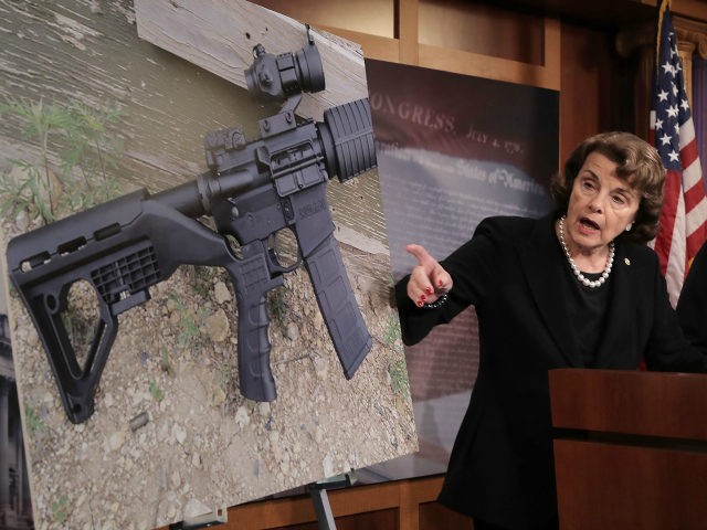 Sen. Dianne Feinstein (D-CA) (C) and Sen. Richard Blumenthal (D-CT) points to a photograph of a rifle with a 'bump stock' during a news conference to announce proposed gun control legislation at the U.S. Capitol October 4, 2017 in Washington, DC. In reaction to Sunday's mass shooting in Las Vegas …