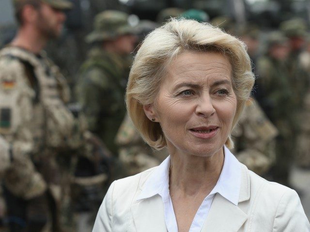 NEUSTADT AM RUEBENBERGE , GERMANY - JUNE 29: German Defense Minister Ursula von der Leyen chats with soldiers of the Bundeswehr, the German armed forces, following a demonstration of capabilities of Panzergranadierbataillon 33 of the 1st Panzer Division (1. Panzerdivision) that included the new Puma infantry fighting vehicle on June …