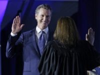 Gavin Newsom swearng in (Rich Pedroncelli / Associated Press) Gavin Newsom swearng in (Rich Pedroncelli / Associated Press)