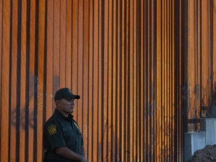 Border Patrol officers keep watch before US Department of Homeland Security Secretary Kirstjen M. Nielsen inaugurates the first completed section of President Trumps 30-foot border wall in the El Centro Sector, at the US Mexico border in Calexico, California on October 26, 2018. (Photo by Mark RALSTON / AFP) (Photo …