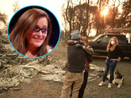 (INSET: PG&E CEO Geisha Williams) TOPSHOT - Kimberly Spainhower hugs her husband Ryan Spainhower while their daughter Chloe Spainhower, 13, looks on at the burned remains of their home in Paradise, California on November 18, 2018. (Photo by Josh Edelson / AFP) (Photo credit should read JOSH EDELSON/AFP/Getty Images)