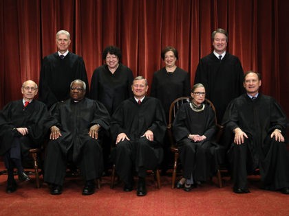 WASHINGTON, DC - NOVEMBER 30: United States Supreme Court (Front L-R) Associate Justice St