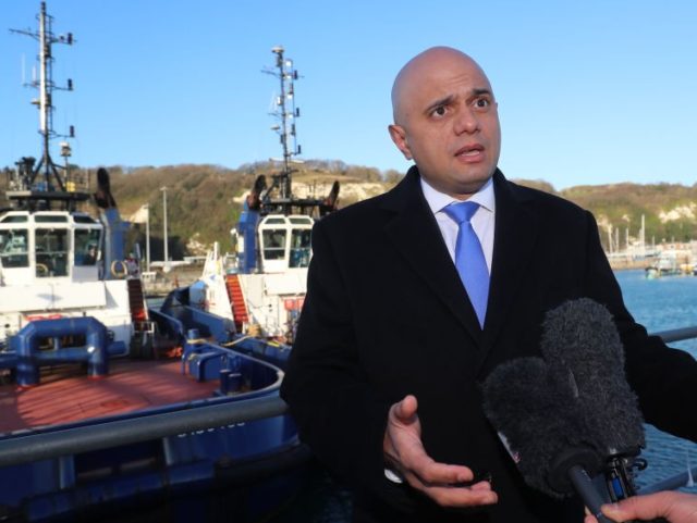 DOVER, ENGLAND - JANUARY 2: Home Secretary Sajid Javid meeting Border Force staff on board HMC Searcher on January 2nd, 2018 in Dover, England. The UK is stepping up patrols after a recent surge in the number of migrants attempting to navigate the English Channels busy shipping lanes in small …