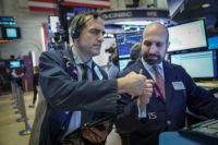 NEW YORK, NY - JANUARY 4: Traders and financial professionals work on the floor of the New York Stock Exchange (NYSE) ahead of the opening bell, January 4, 2019 in New York City. Following a strong December jobs report, the Dow Jones Industrial Average rose 350 points at the open …