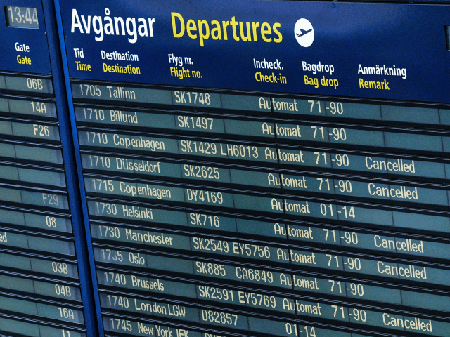 Cancelled flights of Scandinavian Airlines SAS are seen on the info board at Arlanda airport north of Stockholm, Sweden, June 13, 2016. SAS cancelled 230 flights from Stockholm Arlanda airport affecting 27000 passengers following the ongoing pilot strike. / AFP / TT News Agency / Johan Nilsson/TT / Sweden OUT …