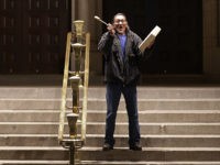 WASHINGTON, DC - APRIL 27: Native Youth Alliance Executive Director Nathan Phillips of Omaha Tribe in Nebraska beats a drum on the steps in front of the Trump International Hotel during a protest April 27, 2017 in Washington, DC. Organized by The Indigenous Environmental Network, the protesters gathered in front …
