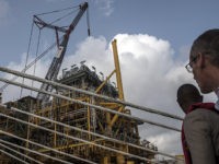 NIGERIA-ENERGY-OIL-INVESTIMENT A photo taken on February 23, 2018 shows a view of one of the six locally assembled modules to be fitted onto the Egina FPSO berthed in Lagos harbour, Nigeria. The Egina FPSO (Floating Production Storage and Offloading) unit is the largest FPSO ever installed in Nigeria and has the …