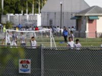HHS shelter for unaccompanied minors Unaccompanied minors in HHS shelter. (AP File Photo: Wilfredo Lee)