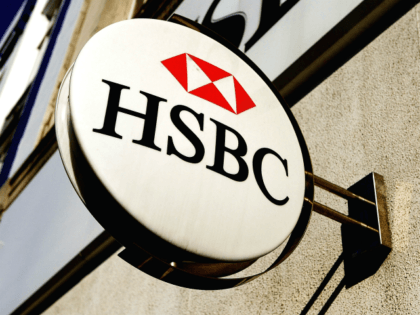 A HSBC sign is seen outside of one of their …