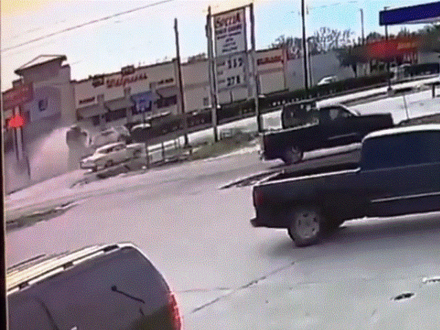 Security video captures the violent impact of a vehicle crash that left a Houston woman de
