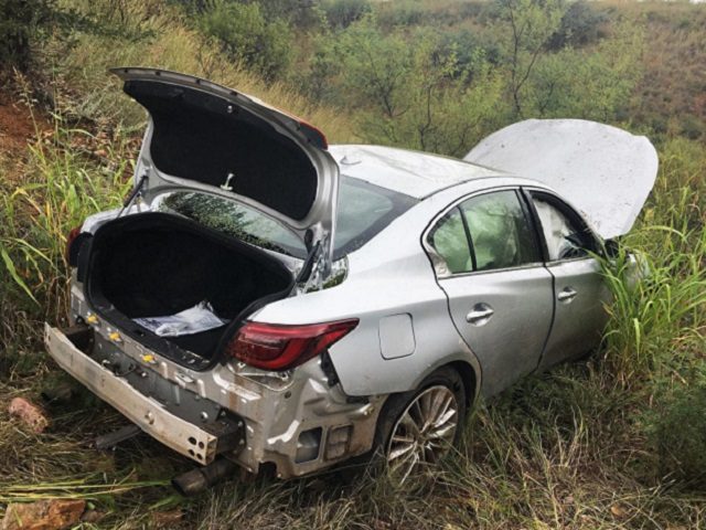 Border Patrol agents find illegal aliens locked in trunk of an Infiniti Q50 after the driver fled from agents at a high rate of speed. (Photo: U.S. Border Patrol)