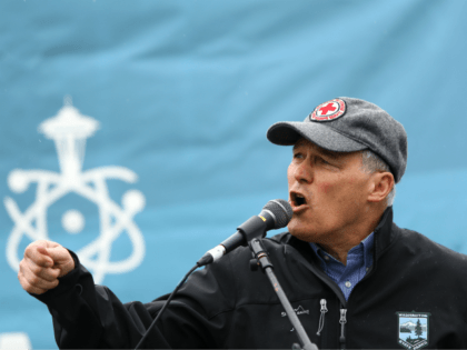 SEATTLE, WA - APRIL 22: Washington state Governor Jay Inslee speaks at a rally during the