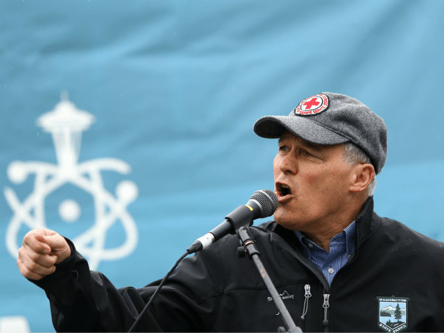 SEATTLE, WA - APRIL 22: Washington state Governor Jay Inslee speaks at a rally during the March for Science at Cal Anderson Park on April 22, 2017 in Seattle, Washington. Participants were advocating for science that upholds the common good and for political leaders and policy makers to enact evidence …
