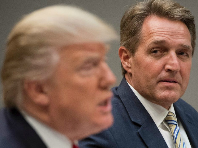 Senator Jeff Flake, seen here at a White House meeting early this month with President Donald Trump, says a deal to regularize many undocumented immigrants is in the making (AFP/File SAUL LOEB)