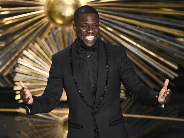 FILE- In this Feb. 28, 2016, file photo, Kevin Hart speaks at the Oscars at the Dolby Thea