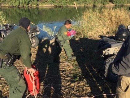 Laredo South Station agents rescue a 10-month-old boy and his mother from the Rio Grande River. (Photo: U.S. Border Patrol/Laredo Sector)