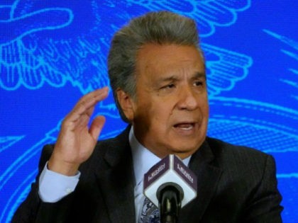 Ecuadorean President Lenin Moreno speaks during an interview with local press at Carondelet Palace in Quito on December 6, 2018, after Ecuadorean Vice-President Maria Alejandra Vicuna resigned. - Moreno said conditions met for Assange to leave the Ecuadorean embassy in London. (Photo by RODRIGO BUENDIA / AFP) (Photo credit should …