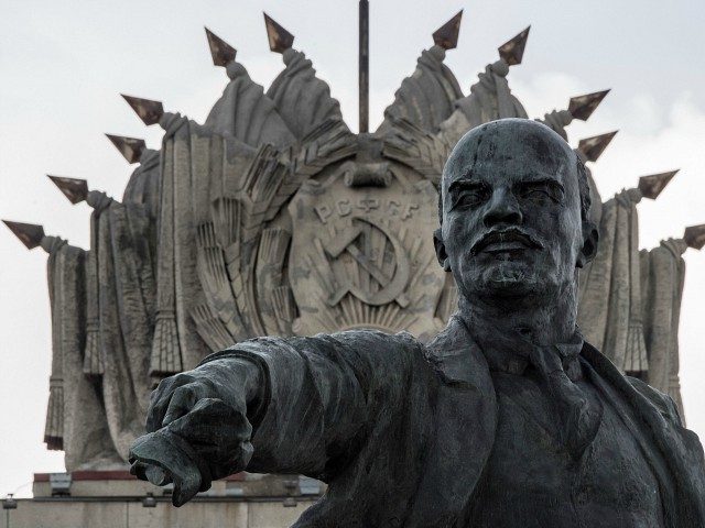 A photo taken on June 25, 2017 shows a sculpture of the founder of the Soviet Union Vladimir Lenin erected in 1970 at Moscow Square in front of the House of Soviets in Saint Petersburg. This year Russia will mark the 100 Anniversary of the Bolshevik Revolution also known as …
