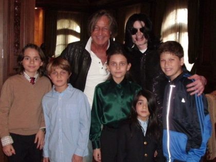 WESTWOOD, CA - NOVEMBER 27: In this handout photo provided by Mohamed Hadid, singer Michael Jackson (3rd R) poses with real estate developer Mohamed Hadid (3rd L), Hadid's children and Jackson's children Michael Joseph Jr. (L), Paris Michael Katherine (C) and Prince Michael II (2nd R) on November 27, 2008 …